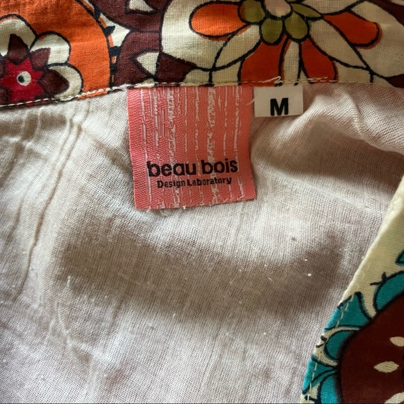 Flowy multi-colored pattern skirt with gold trim - Picture 3 of 6